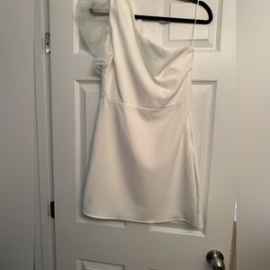 A mini one shoulder dress. Perfect for a bachelorette party!